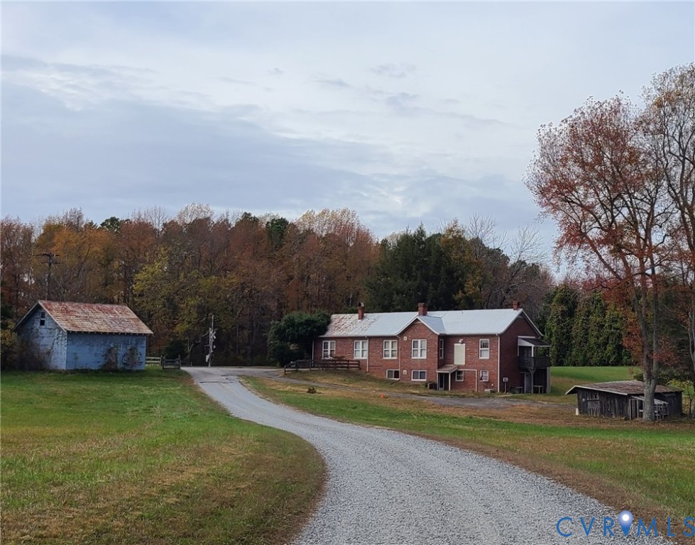 16124 Beaverdam School Road Beaverdam, VA 23015 - Photo 4 of 50 a view of a house with a garden and trees