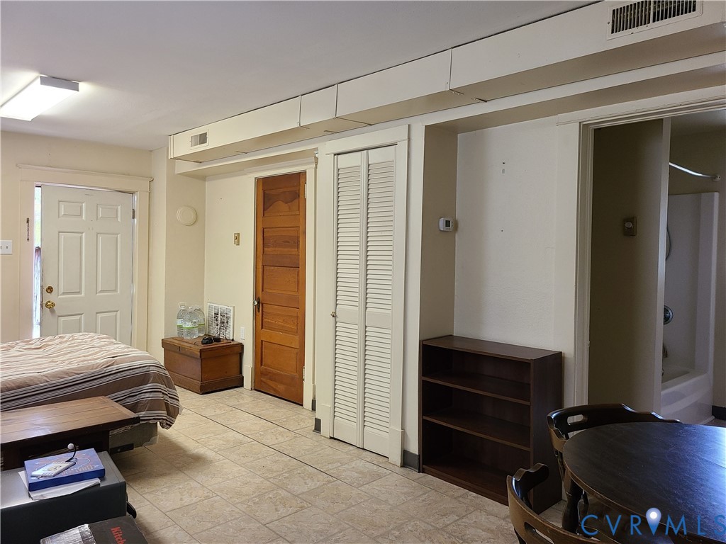 16124 Beaverdam School Road Beaverdam, VA 23015 - Photo 48 of 50 a bedroom with furniture and a closet