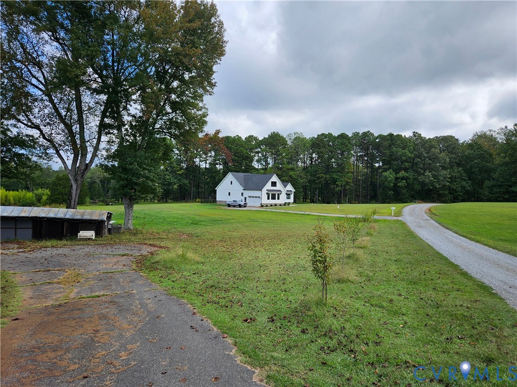 16124 Beaverdam School Road Beaverdam, VA 23015 - Photo 49 of 50 a view of a golf course with a bench