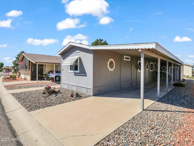 a front view of a house with a porch