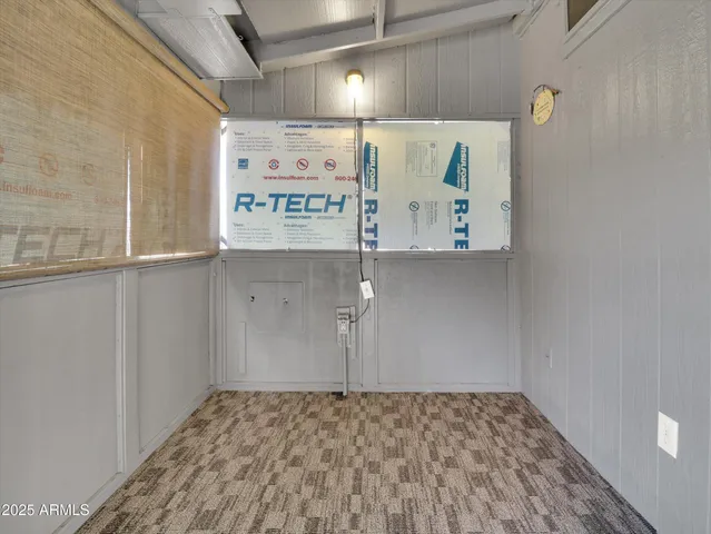 a view of a refrigerator in kitchen