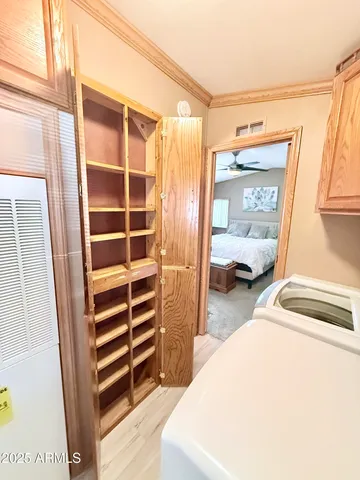 a bedroom with a bed and a walk in closet