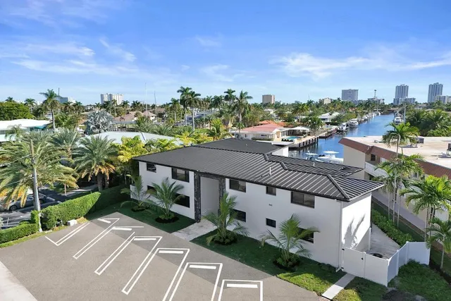 an aerial view of a house with outdoor space