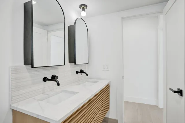 an aerial view of a city with lots of residential buildings