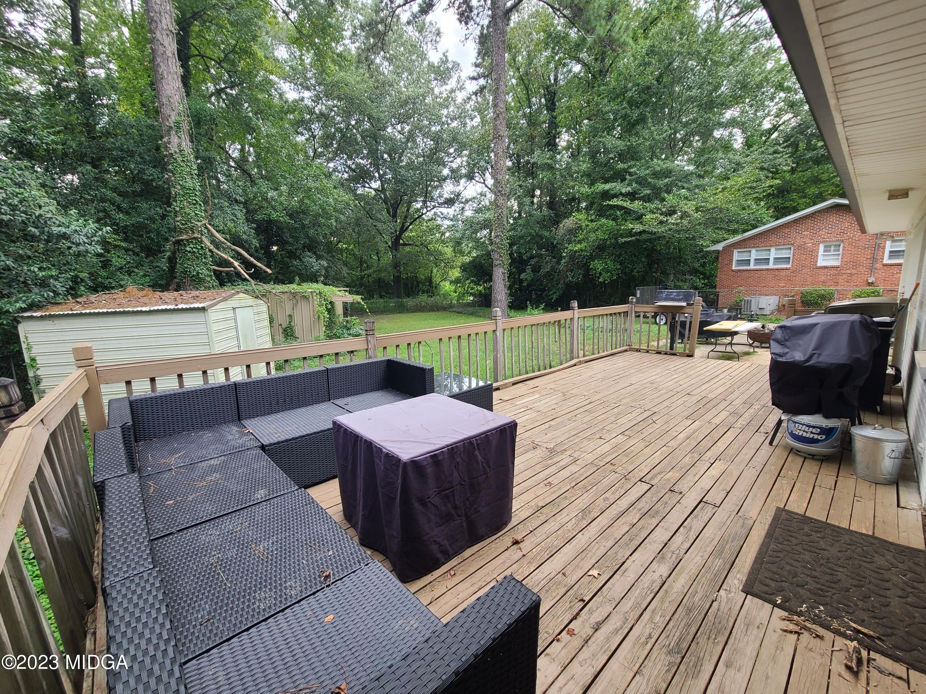 2638 Riverview Road Macon, GA 31204 - Photo 21 of 24 a view of house with patio outdoor seating