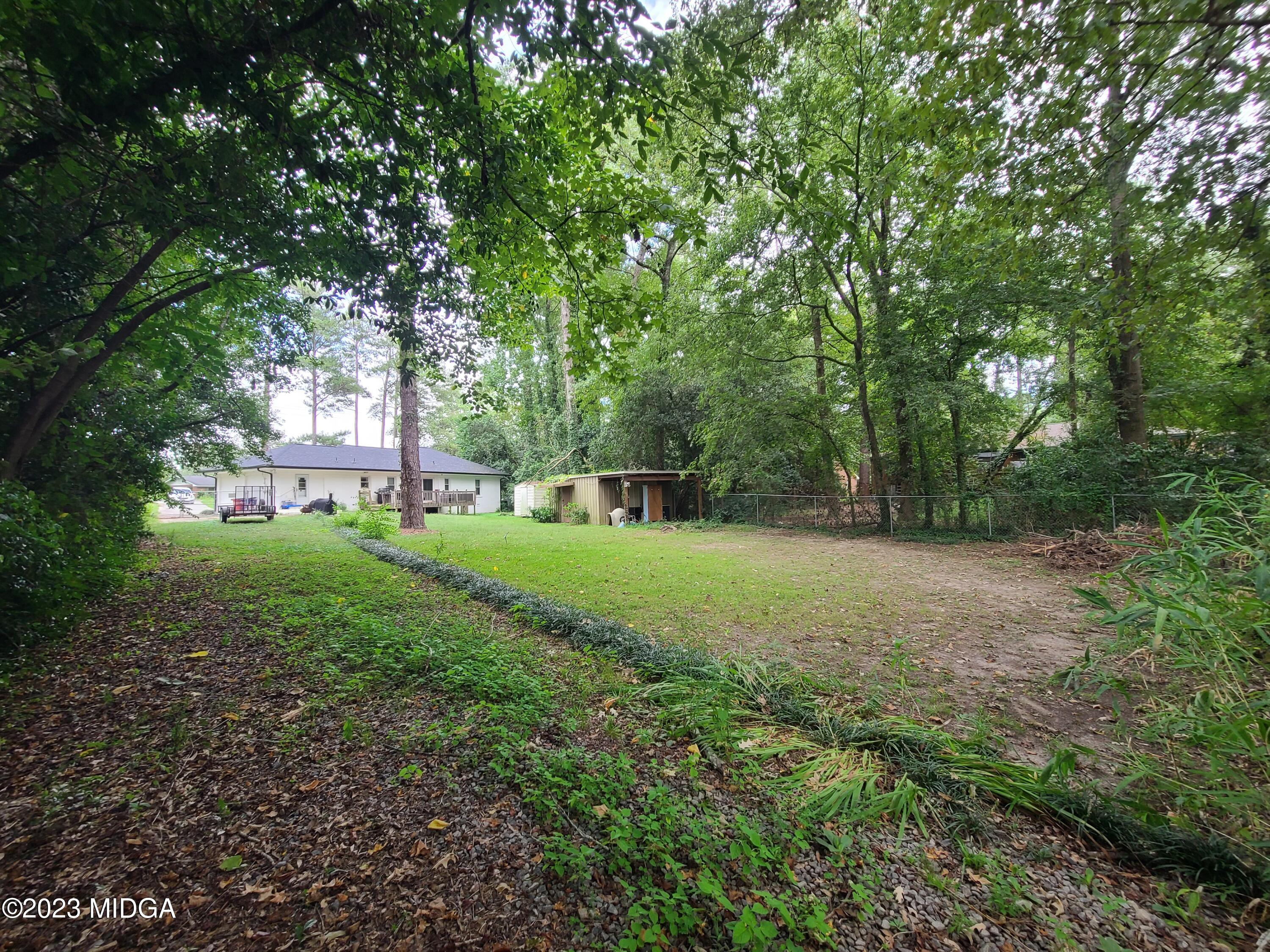 2638 Riverview Road Macon, GA 31204 - Photo 23 of 24 a view of a trees with a yard
