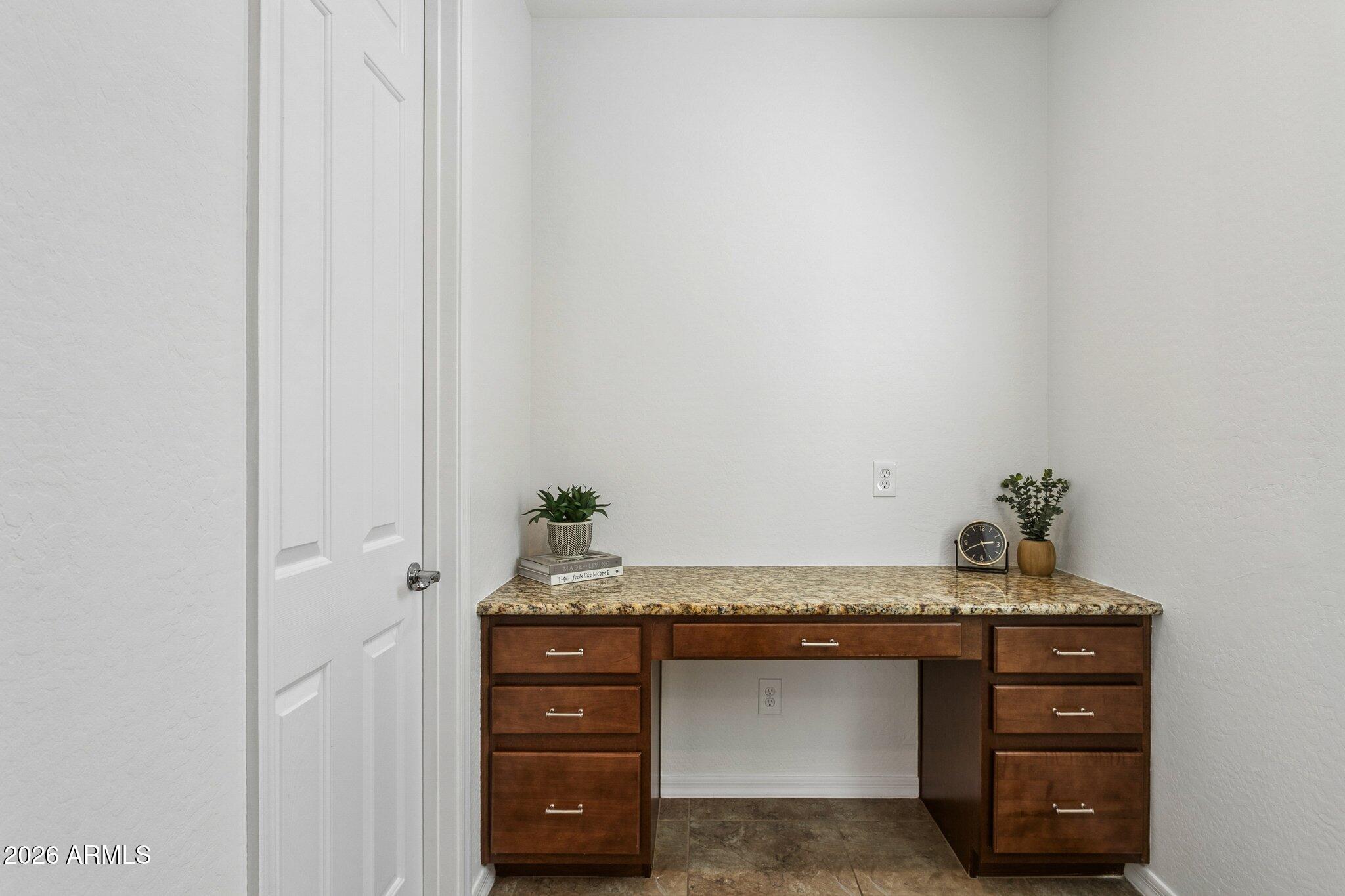 922 South Agnes Lane Gilbert, AZ 85296 - Photo 13 of 43 a room with a cabinets and potted plant