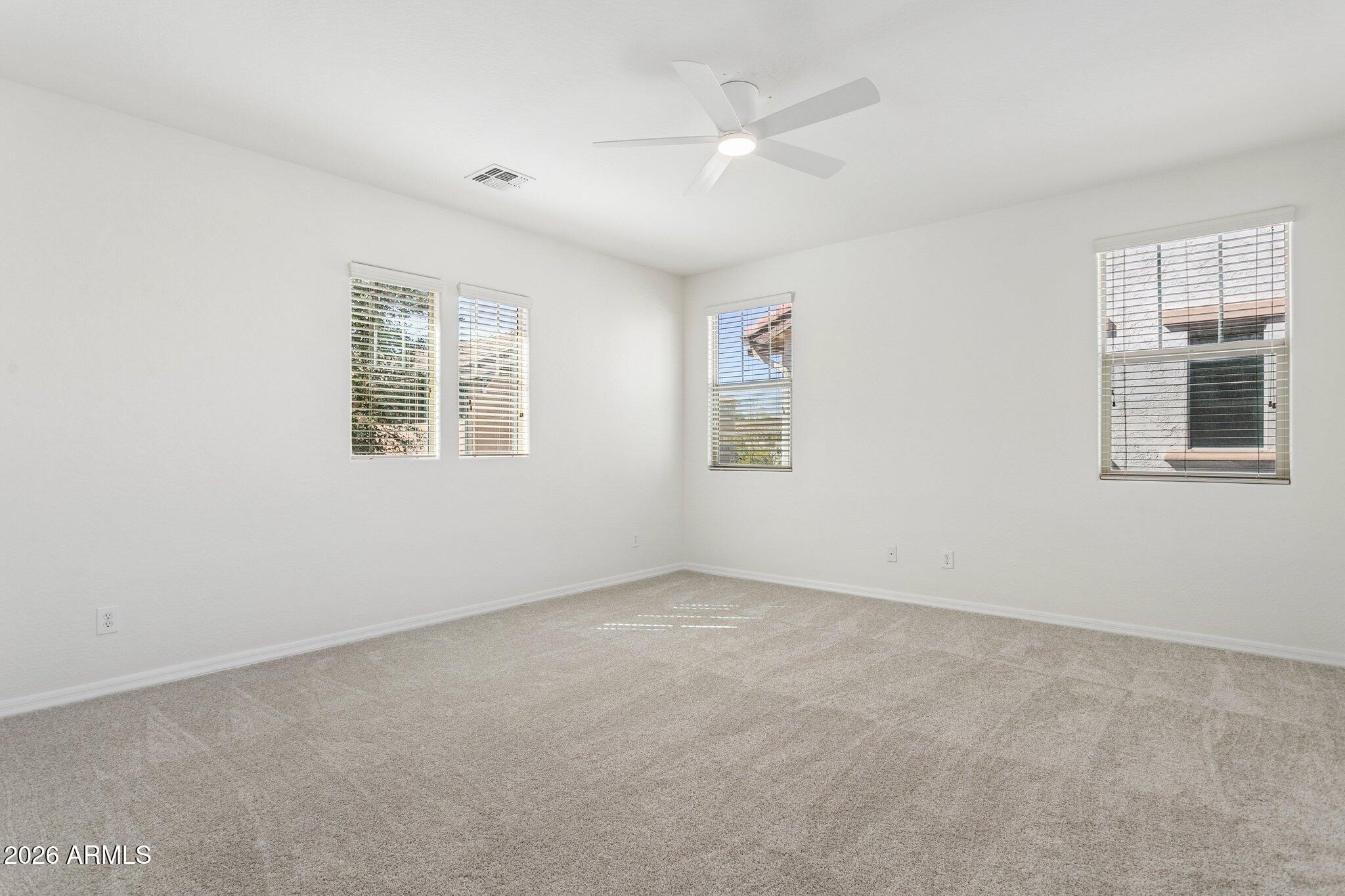 922 South Agnes Lane Gilbert, AZ 85296 - Photo 19 of 43 an empty room with a window