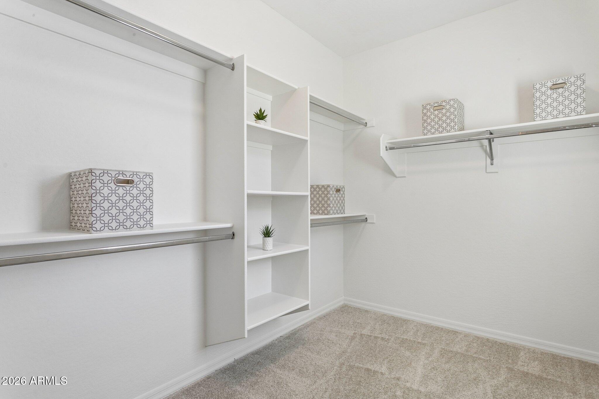 922 South Agnes Lane Gilbert, AZ 85296 - Photo 22 of 43 a view of cabinets and utility room with racks on the wall