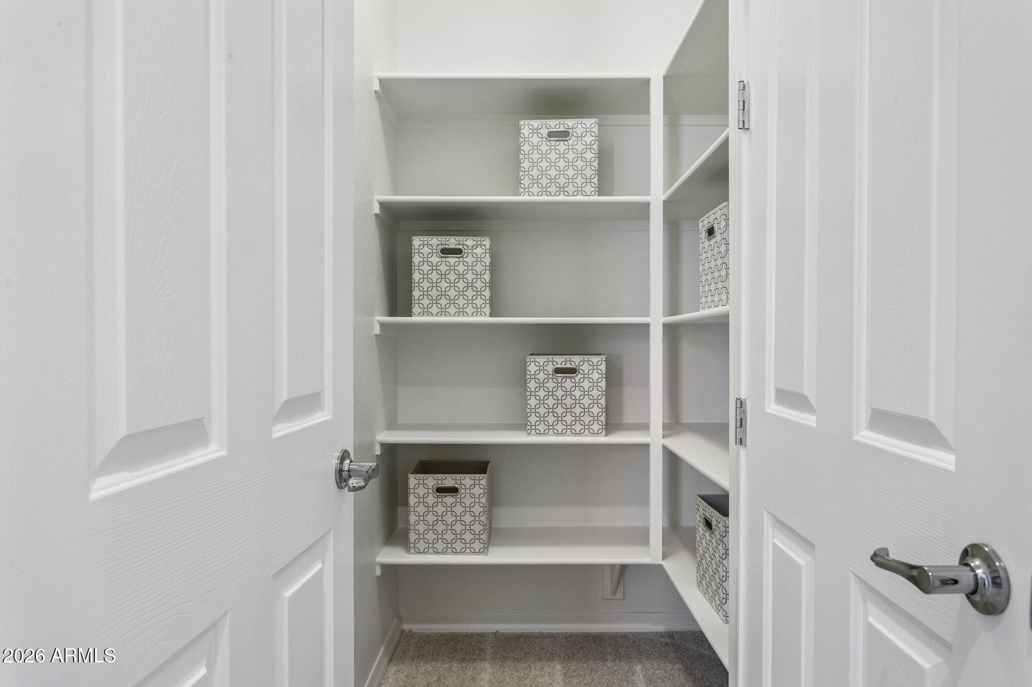 922 South Agnes Lane Gilbert, AZ 85296 - Photo 27 of 43 a view of bedroom with furniture and book shelf
