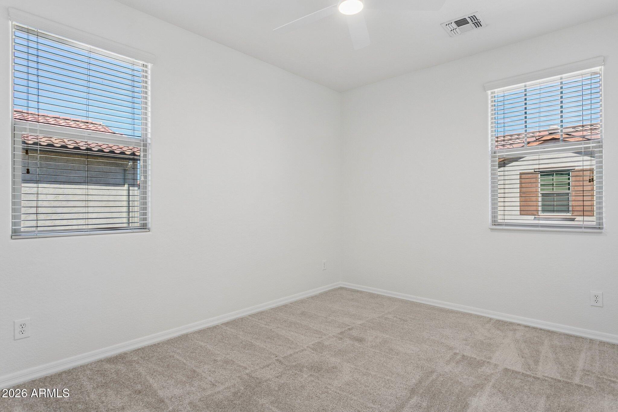 922 South Agnes Lane Gilbert, AZ 85296 - Photo 29 of 43 an empty room with a window