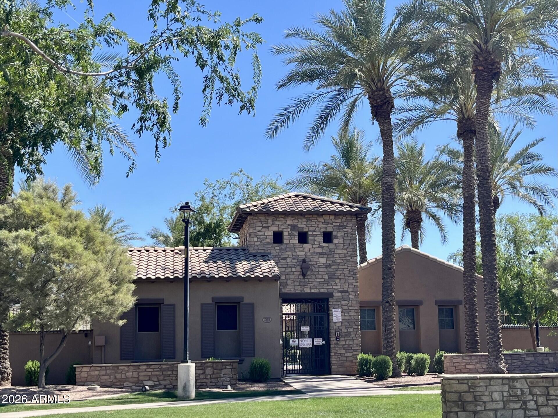 922 South Agnes Lane Gilbert, AZ 85296 - Photo 34 of 43 a front view of a house with yard