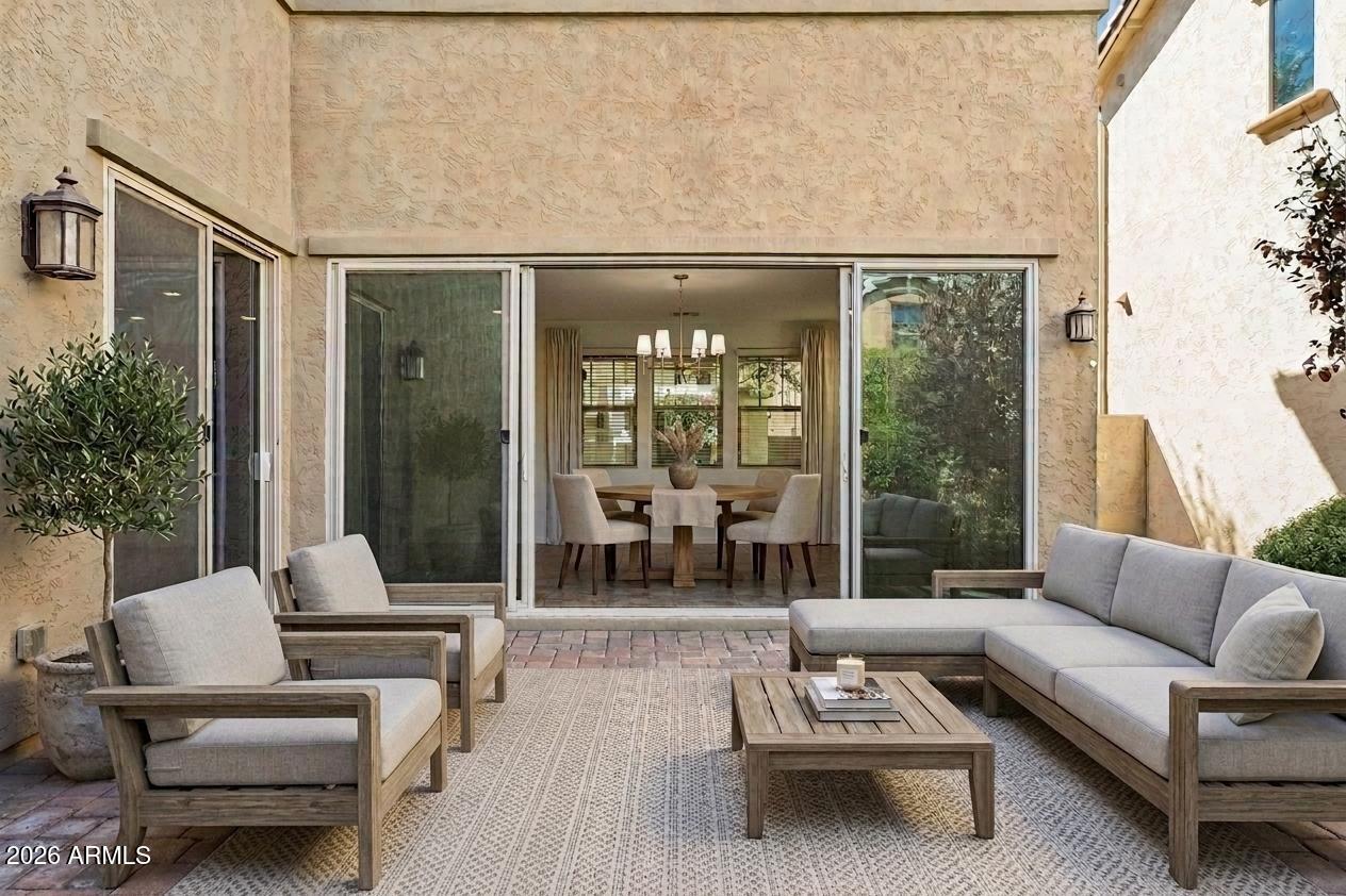 922 South Agnes Lane Gilbert, AZ 85296 - Photo 5 of 43 a living room with furniture and a large window