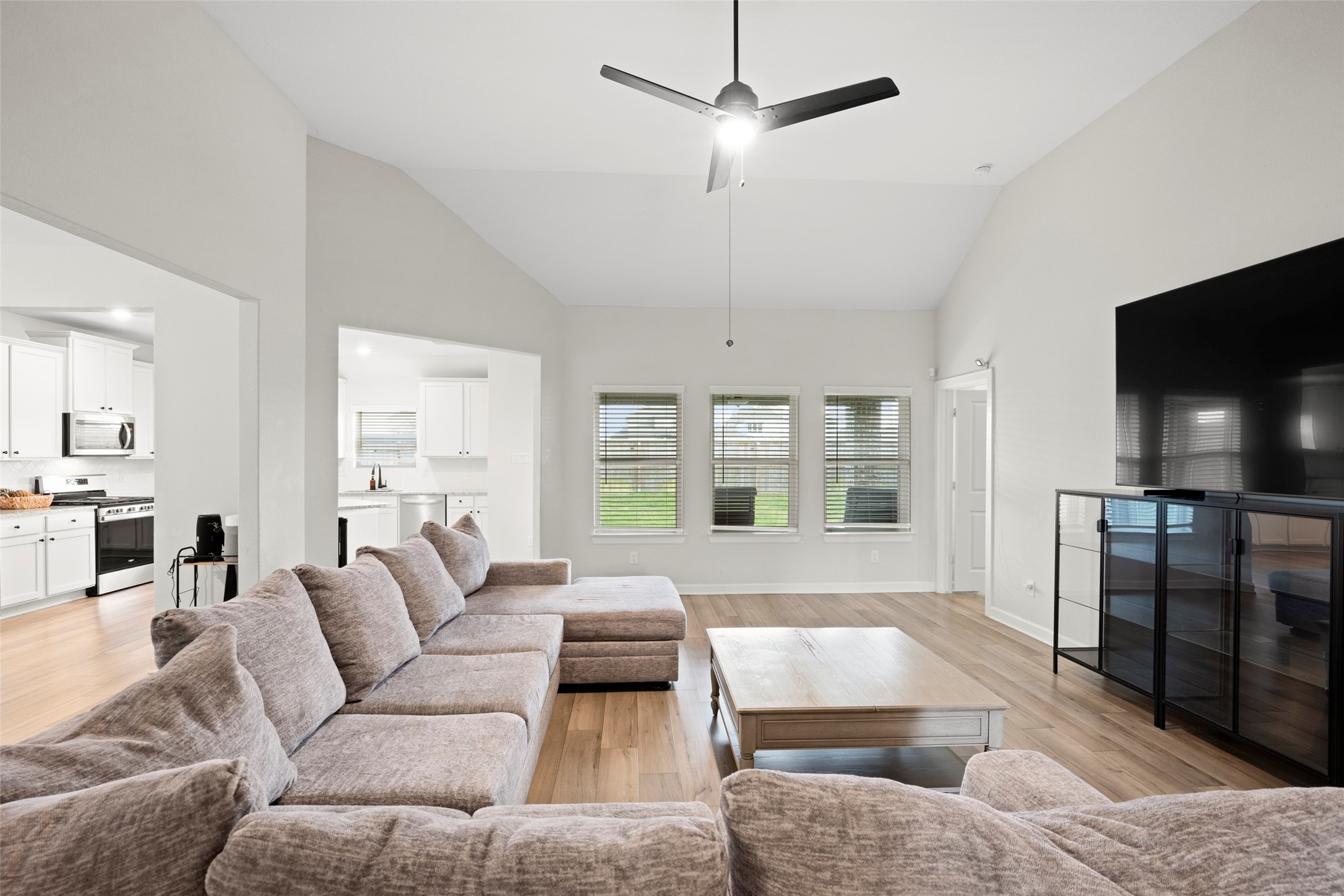 13717 Gaff Rig Drive Texas City, TX 77510 - Photo 11 of 28 a living room with furniture and a flat screen tv