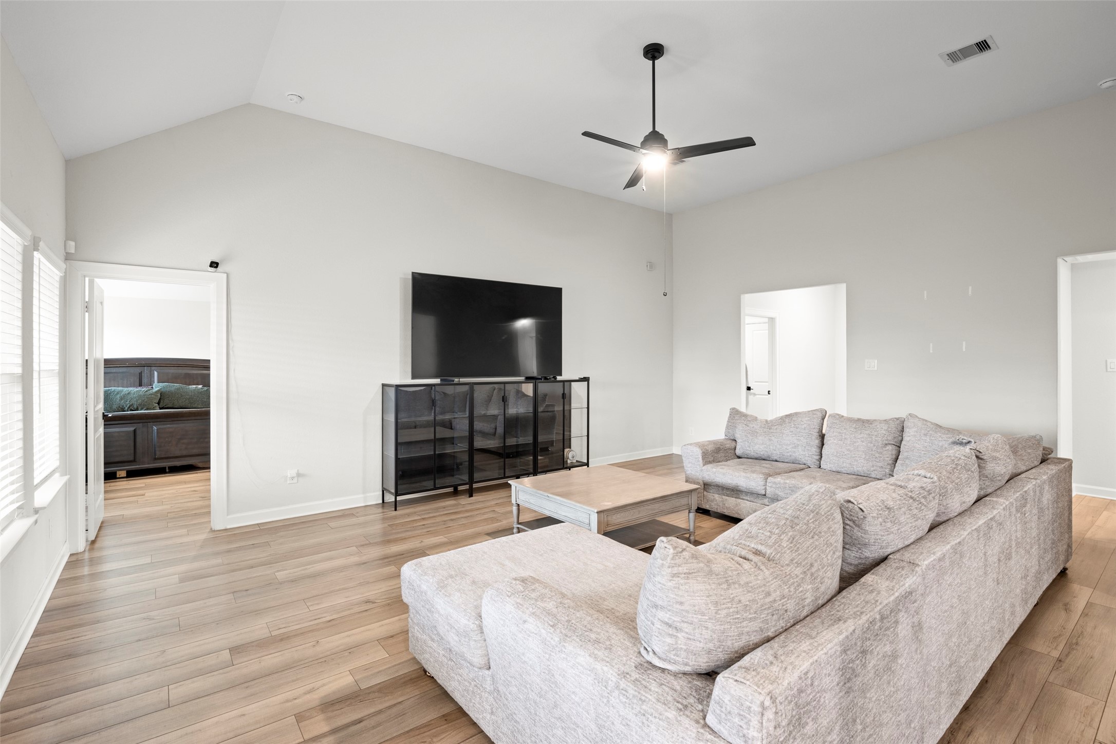 13717 Gaff Rig Drive Texas City, TX 77510 - Photo 14 of 28 a living room with furniture and a flat screen tv