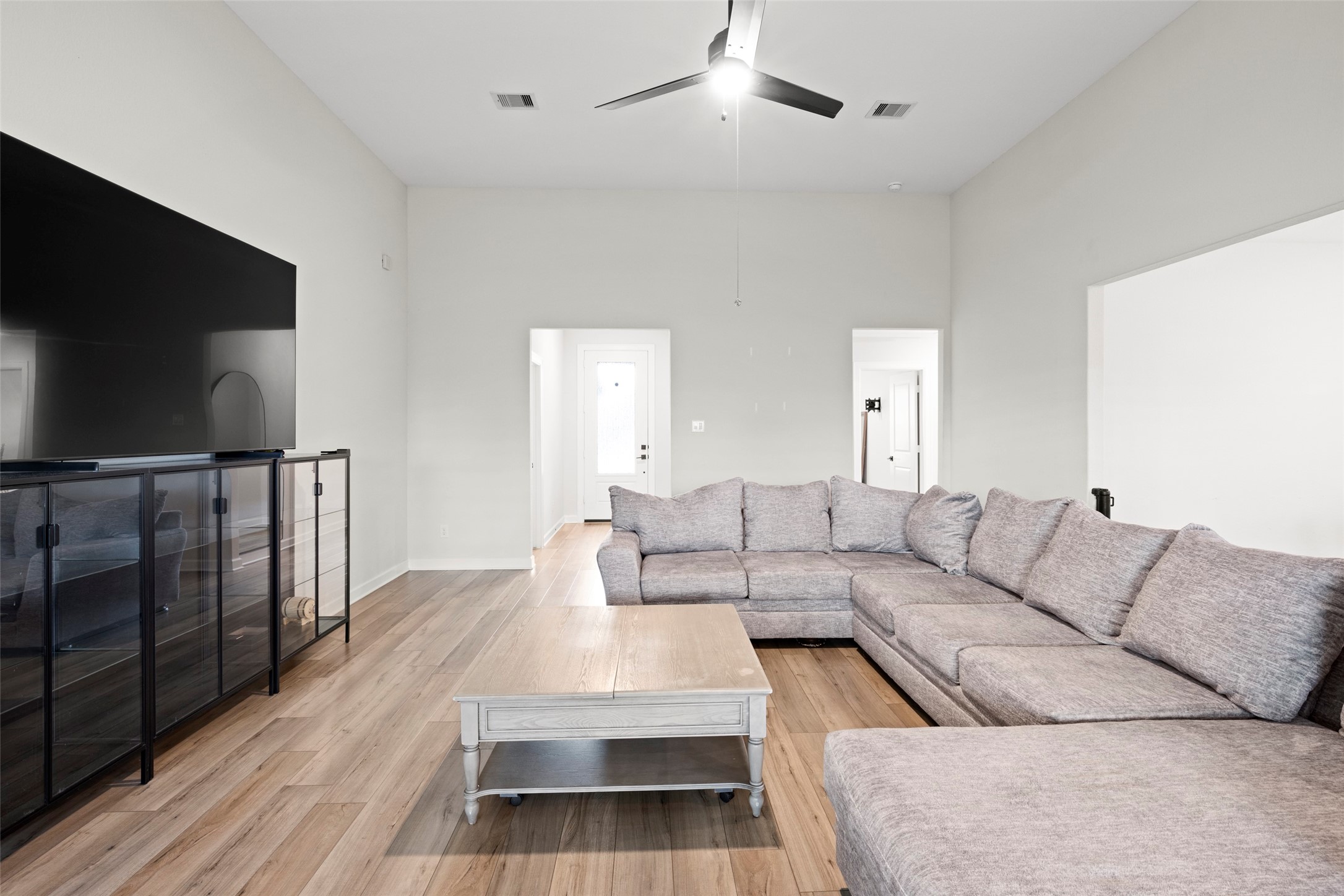 13717 Gaff Rig Drive Texas City, TX 77510 - Photo 16 of 28 a living room with furniture and a flat screen tv