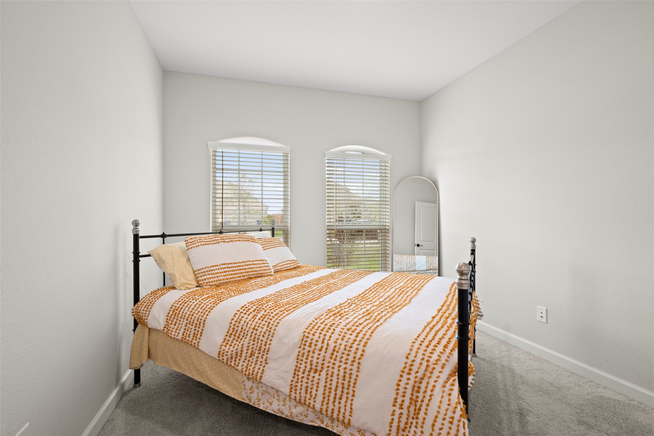 13717 Gaff Rig Drive Texas City, TX 77510 - Photo 20 of 28 a bedroom with a bed and window