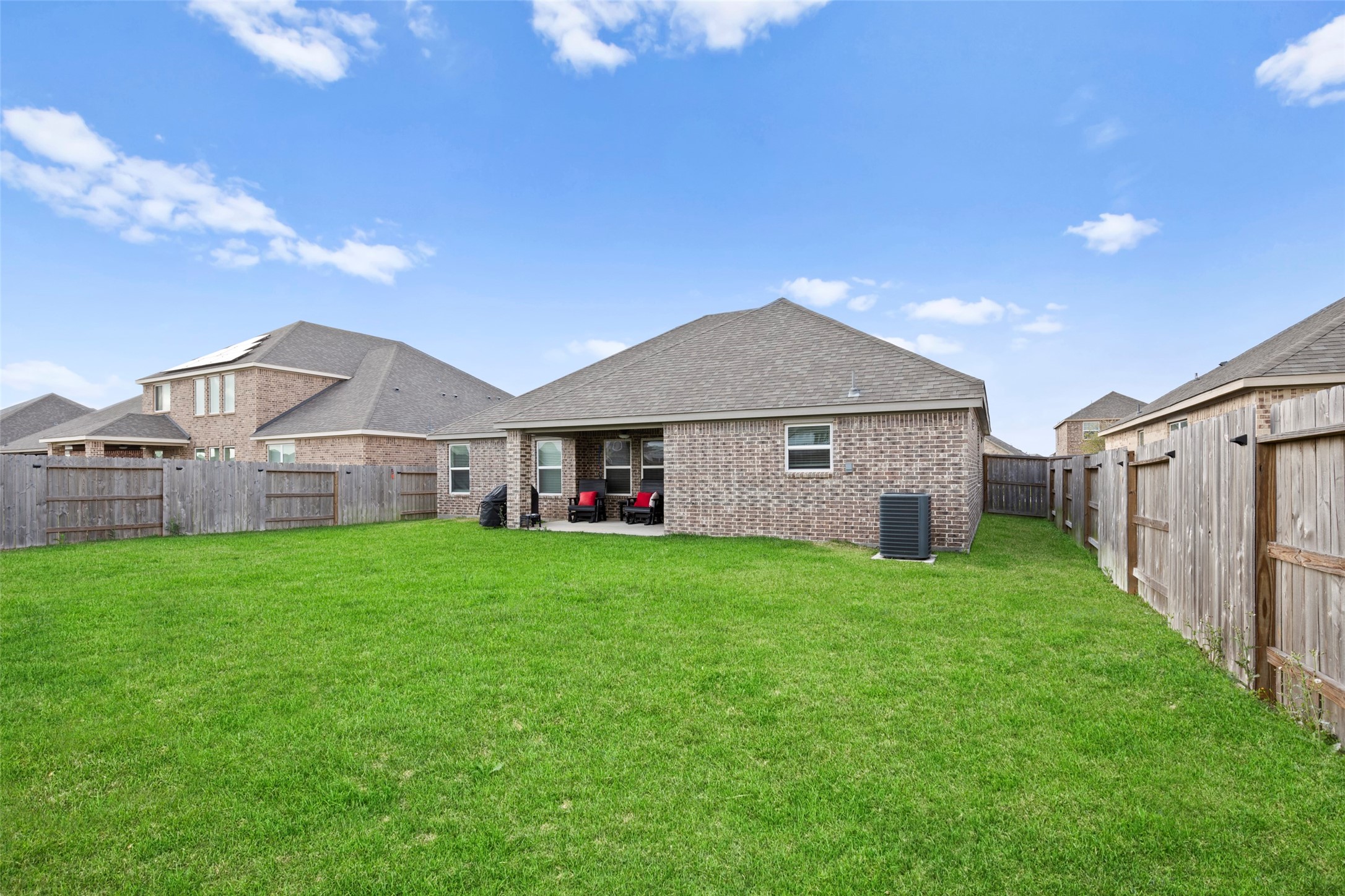 13717 Gaff Rig Drive Texas City, TX 77510 - Photo 26 of 28 a view of a house with backyard and garden