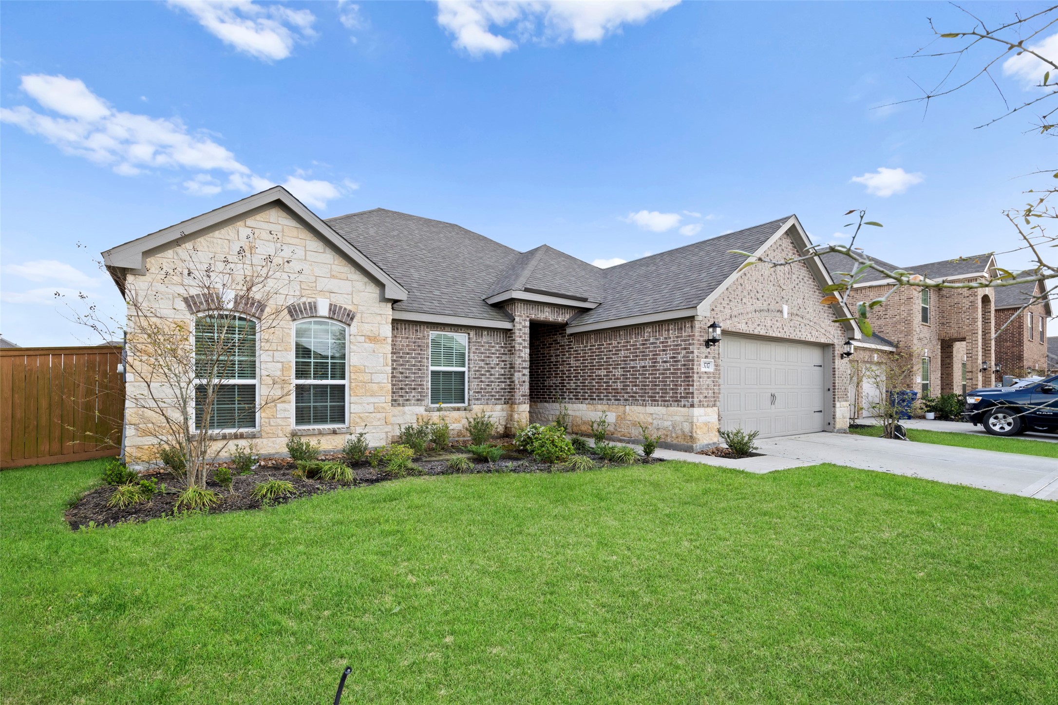 13717 Gaff Rig Drive Texas City, TX 77510 - Photo 3 of 28 a view of a house with a yard and garden