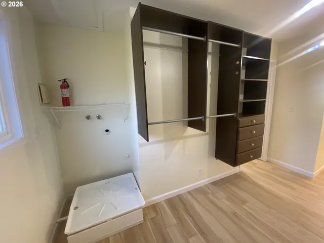 a bathroom with a tub and a shower