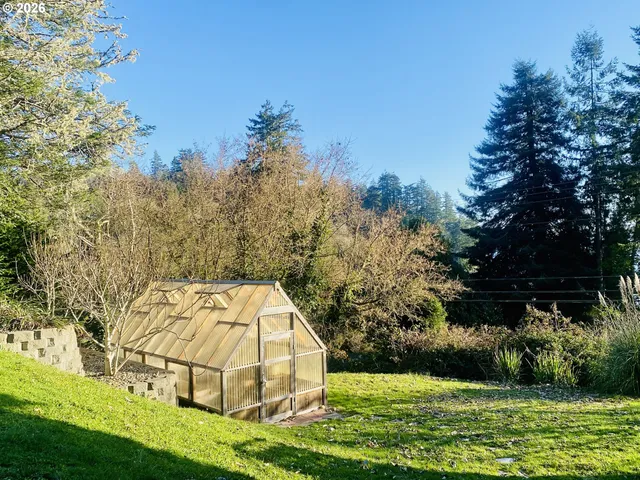 a view of wooden floor with a tennis court