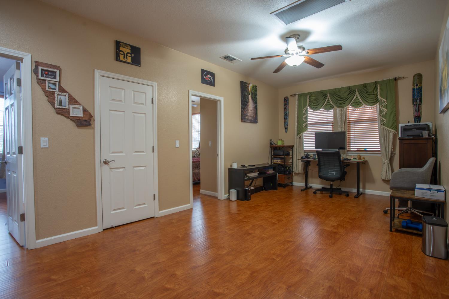 11740 Mani Circle Rancho Cordova, CA 95742 - Photo 27 of 50 a view of a livingroom with workspace and a window