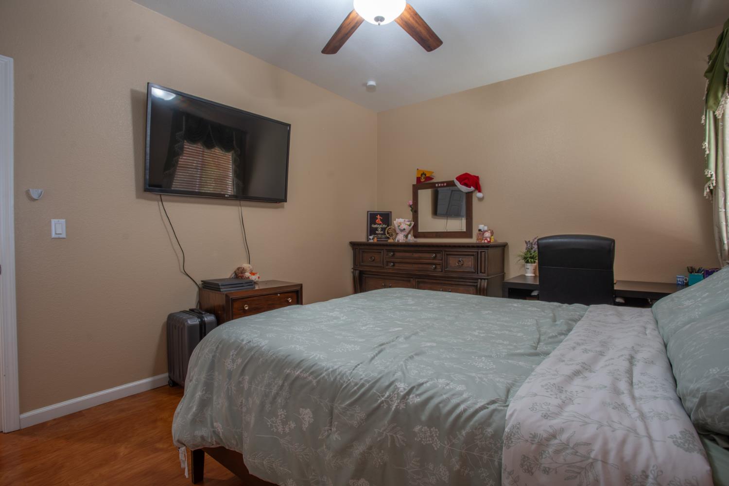 11740 Mani Circle Rancho Cordova, CA 95742 - Photo 39 of 50 a bedroom with a bed and a lamp on dresser