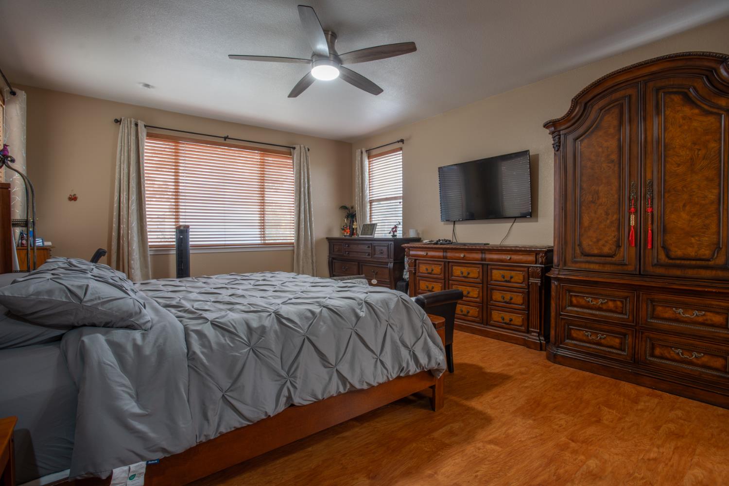 11740 Mani Circle Rancho Cordova, CA 95742 - Photo 40 of 50 a bedroom with a bed and a flat screen tv