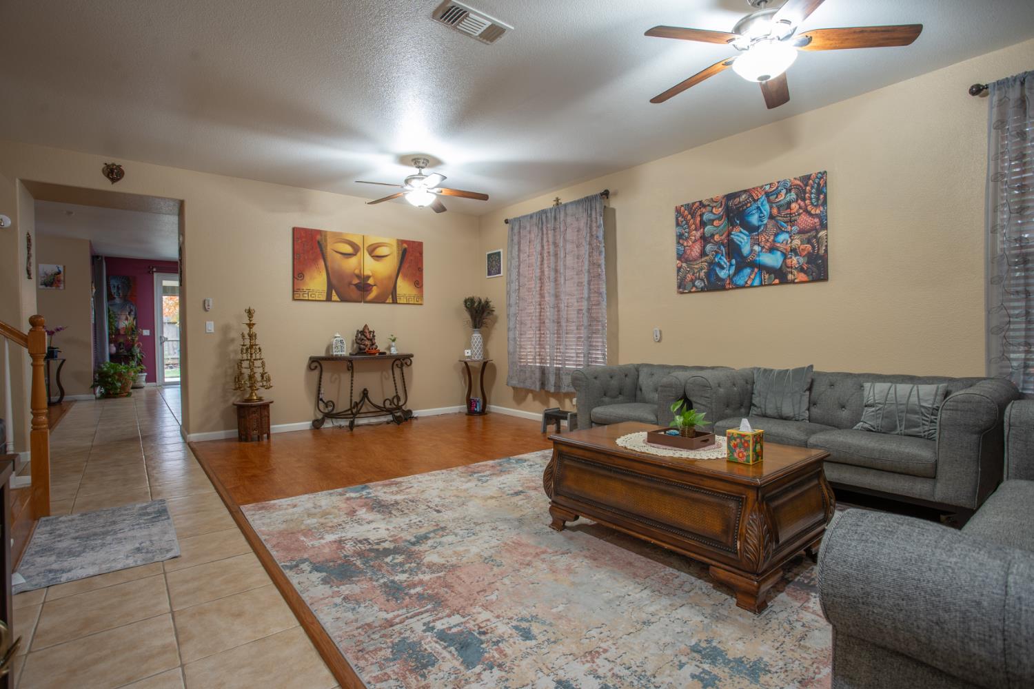 11740 Mani Circle Rancho Cordova, CA 95742 - Photo 8 of 50 a living room with furniture and a chandelier