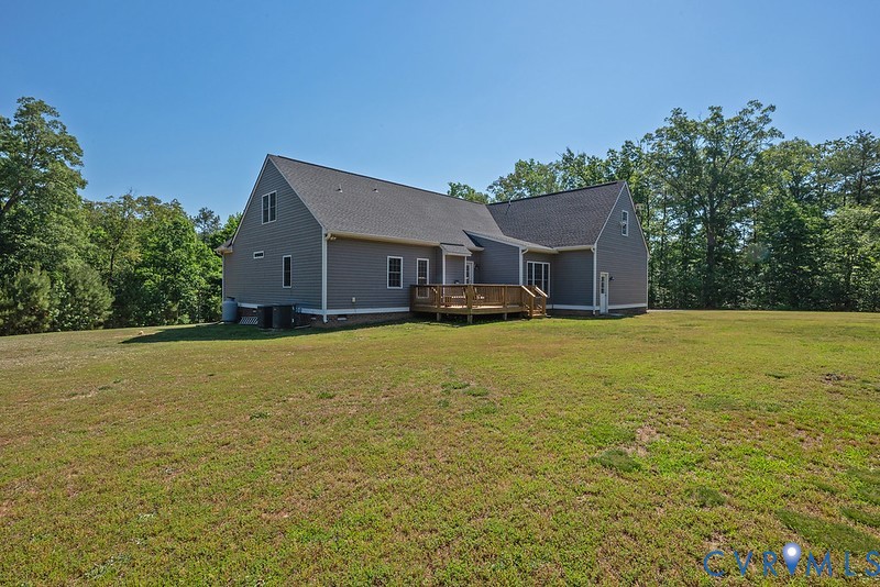 9425 Marie Road New Kent, VA 23124 - Photo 24 of 55 a front view of a house with a yard