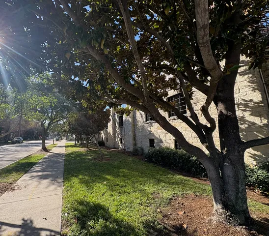a view of a swimming pool with a lounge chairs