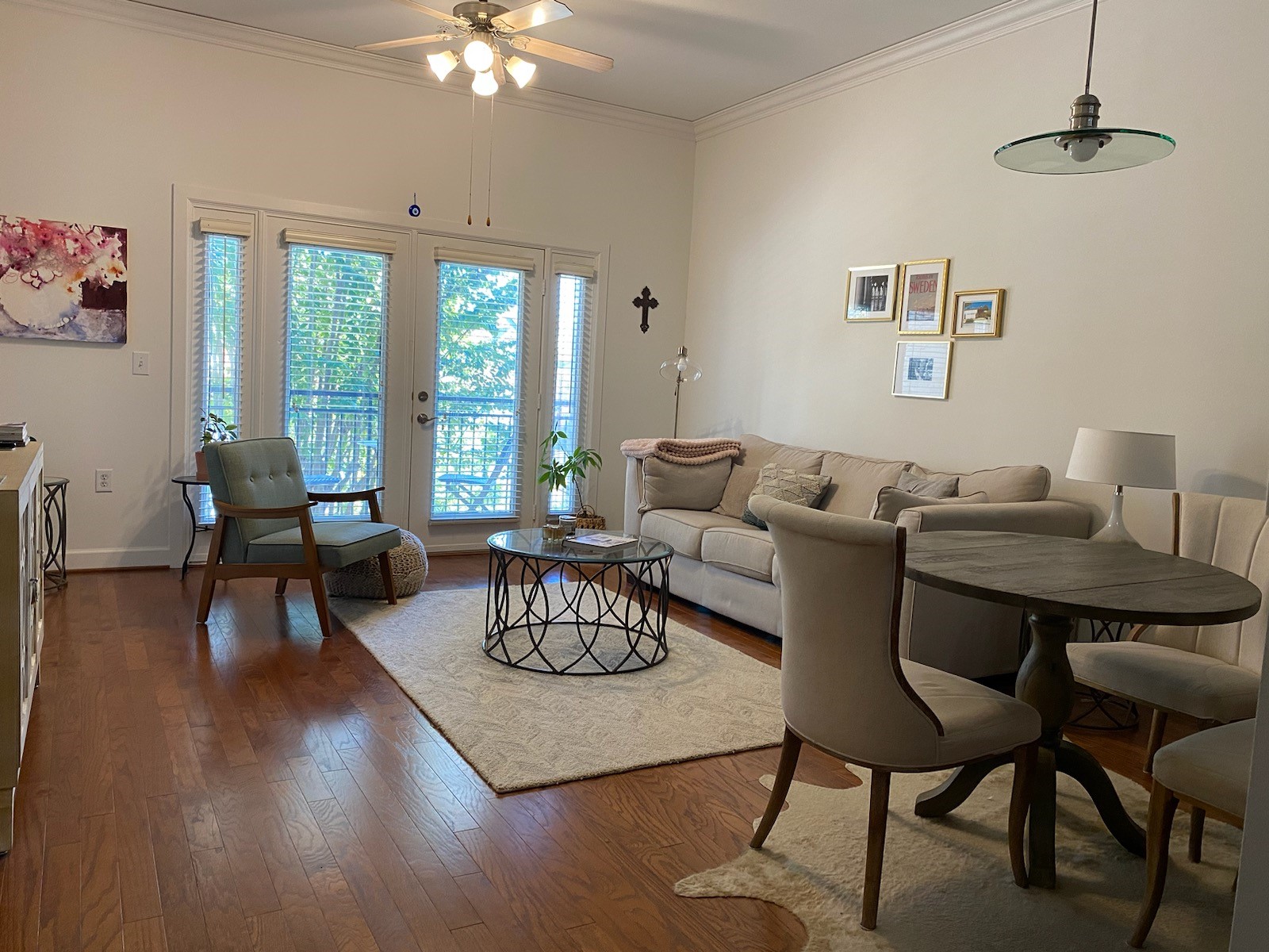 1900 Genesee Street, Unit 103 Houston, TX 77006 - Photo 2 of 7 a living room with furniture a window and a dining table
