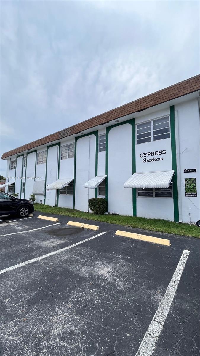 a view of street with large building