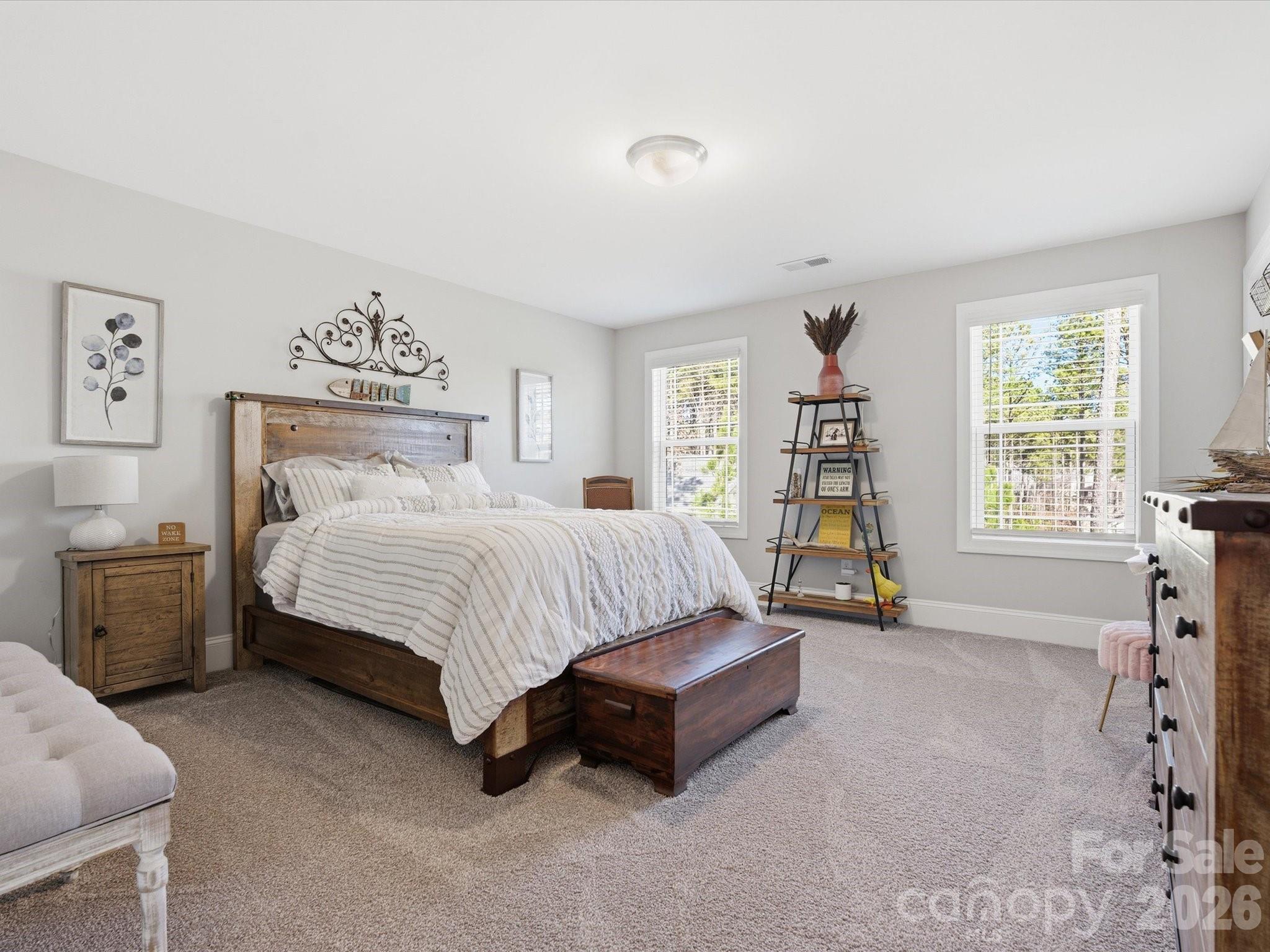 4166 Persimmon Road Lancaster, SC 29720 - Photo 27 of 41 a spacious bedroom with a bed and a large window