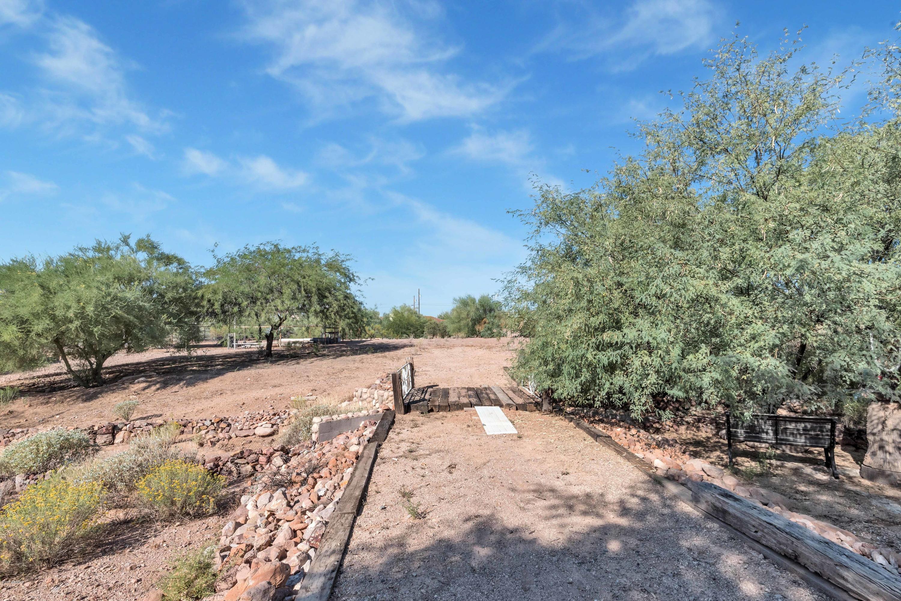 62 South Mountain View Road Apache Junction, AZ 85119 - Photo 28 of 35 Walk way to back of property