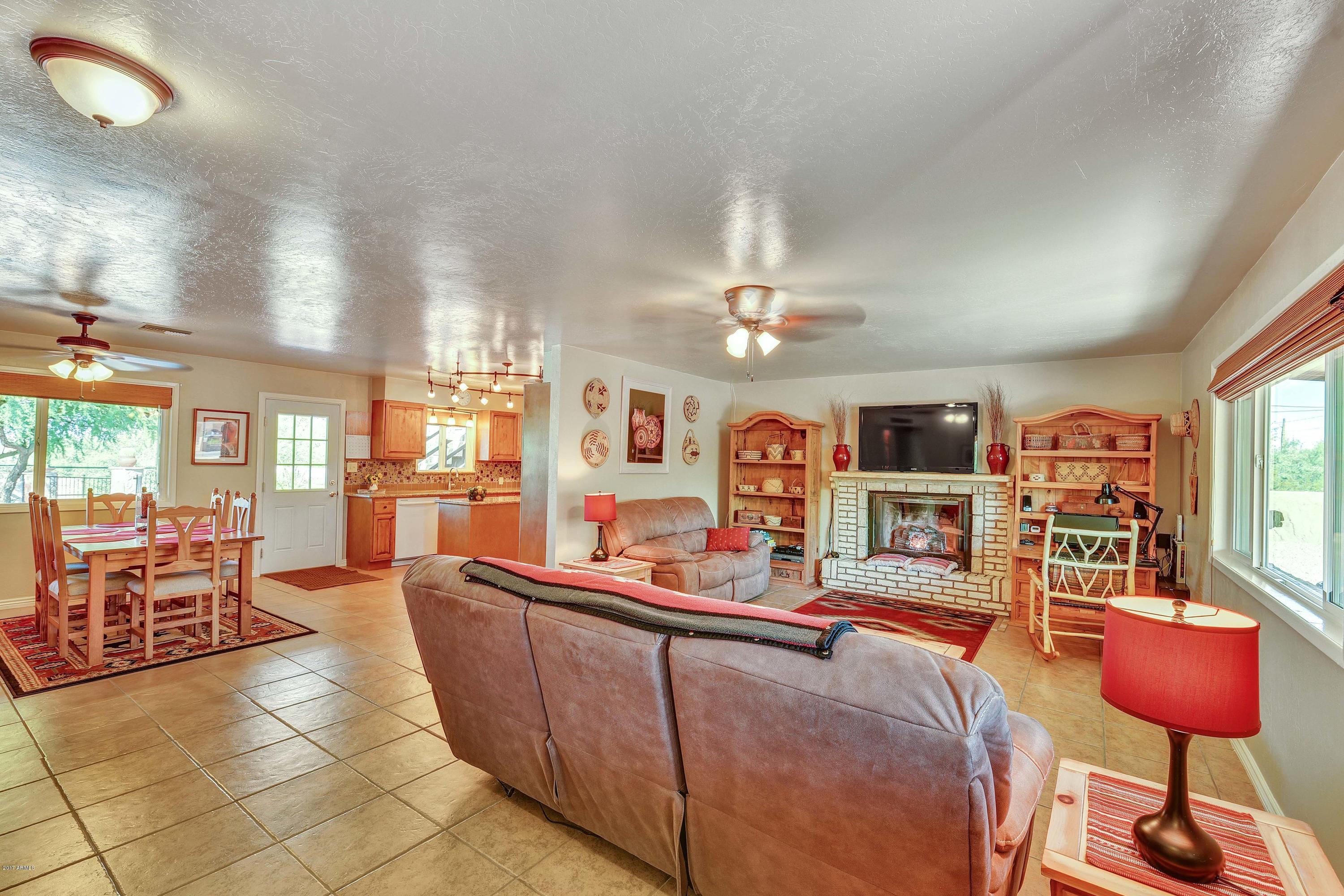 62 South Mountain View Road Apache Junction, AZ 85119 - Photo 3 of 35 Great room w/fireplace