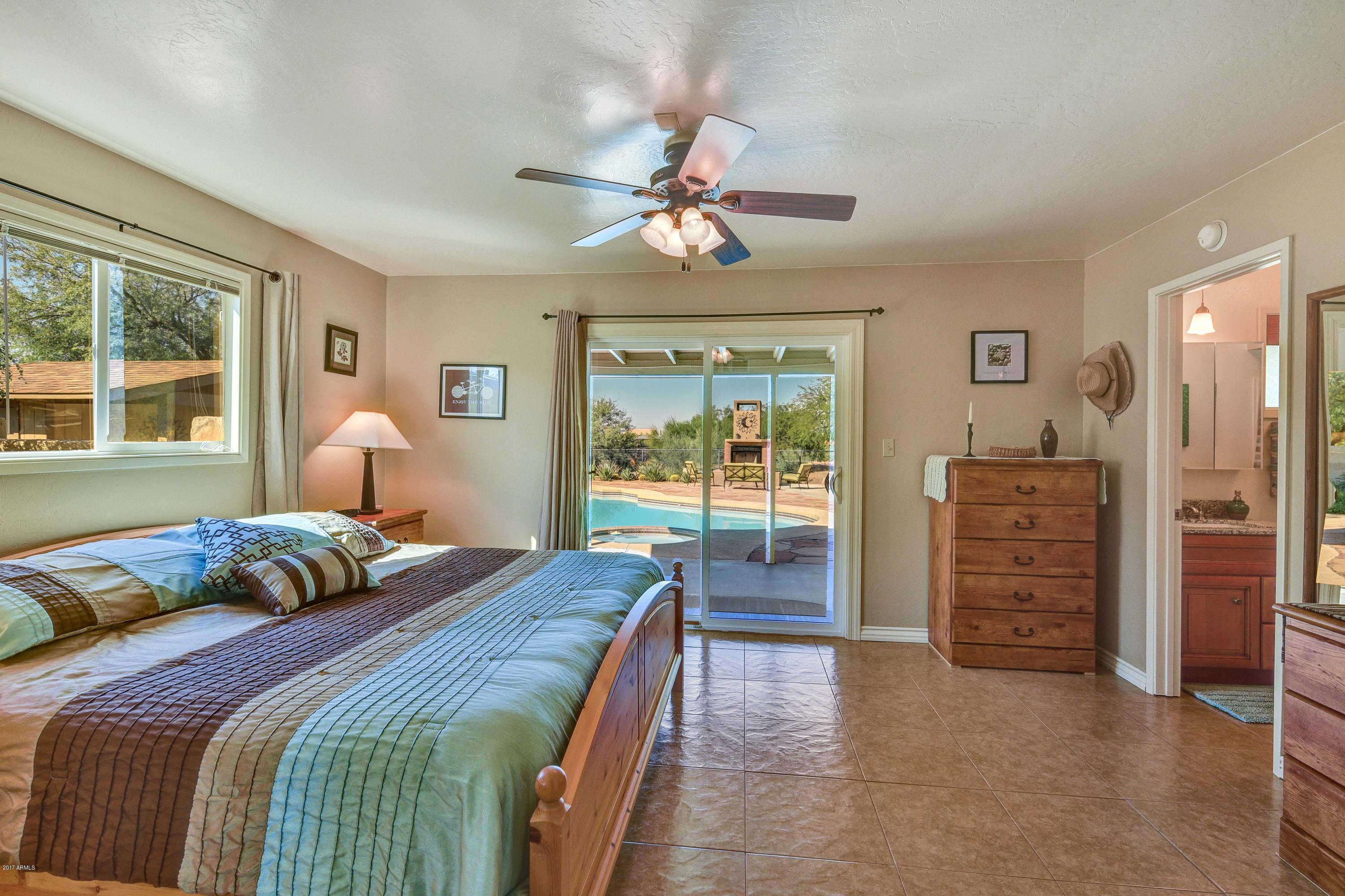 62 South Mountain View Road Apache Junction, AZ 85119 - Photo 8 of 35 Master Suite w/exit to Backyard Oasis