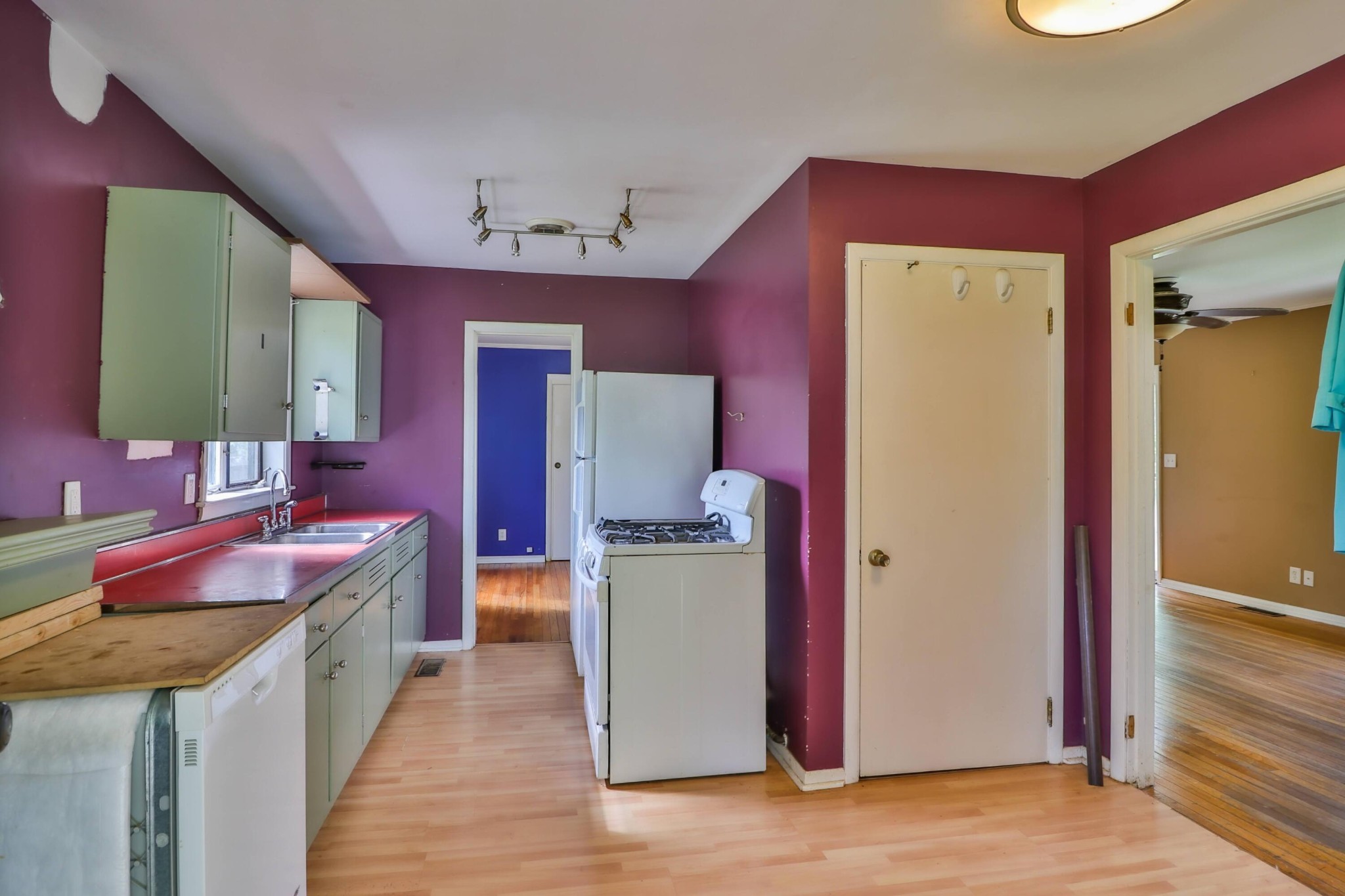 103 South Seneca Road Oak Ridge, TN 37830 - Photo 10 of 26 a kitchen with a sink stove and refrigerator
