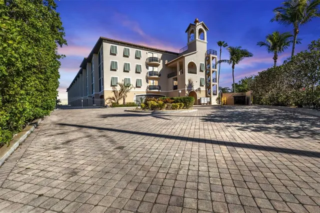 a front view of a house with basketball court