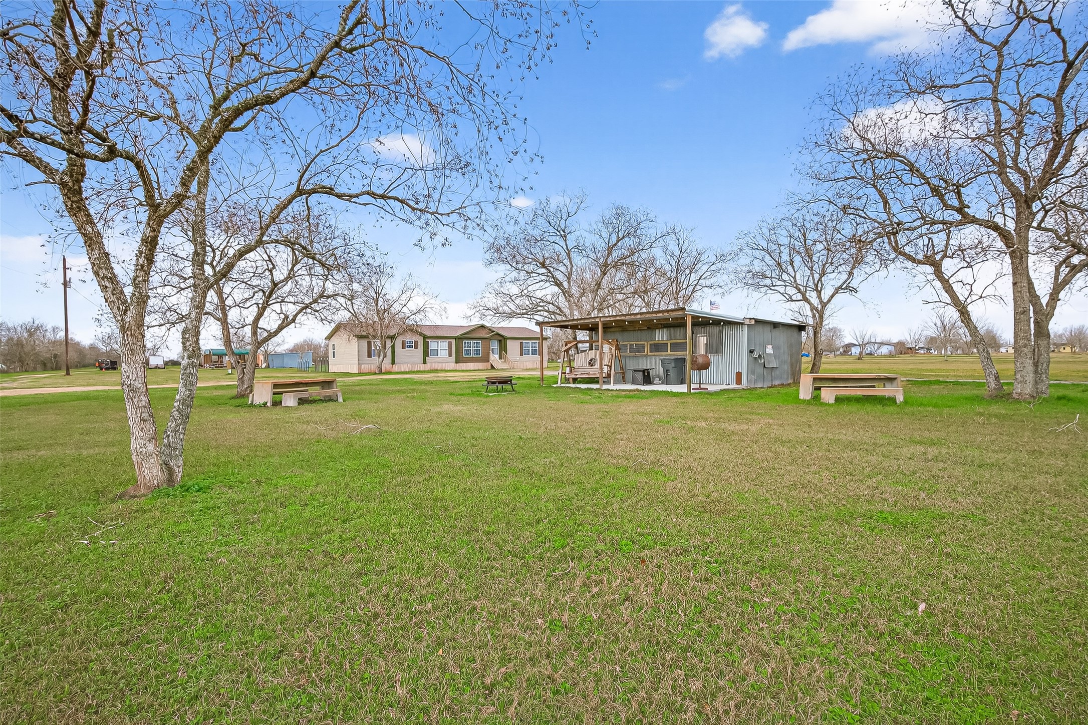 9820 Oberrender Road Needville, TX 77461 - Photo 3 of 34 Front Elevation with Hangout Shed