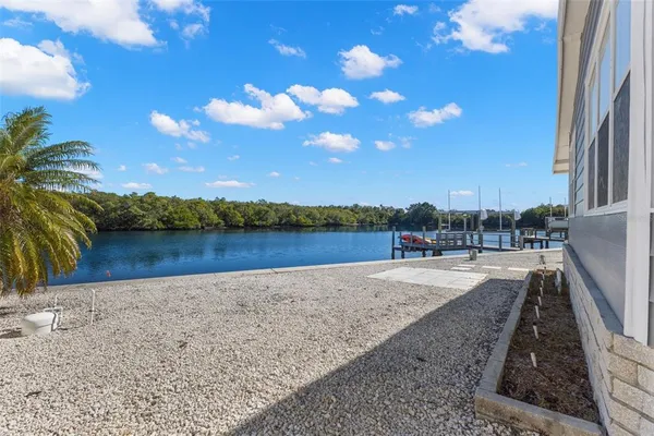 a view of a lake with a yard