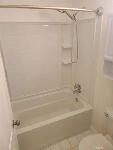 a bathroom with a double vanity sink and mirror