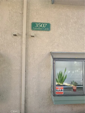 a kitchen with stainless steel appliances a refrigerator sink and cabinets