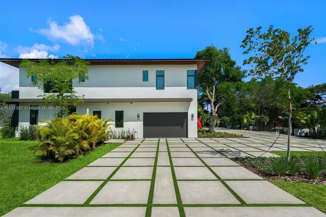 a view of pool with yard