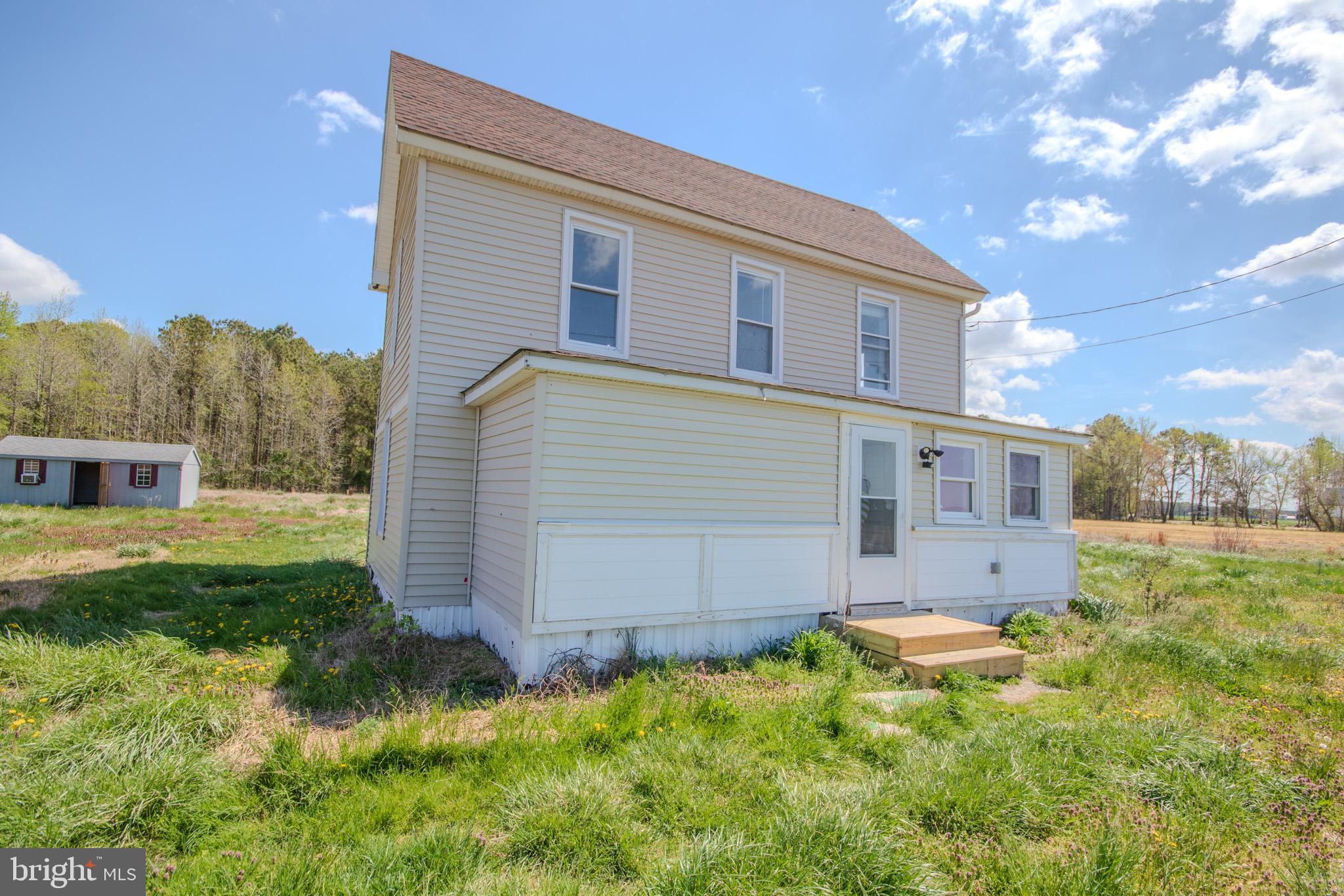 5693 Landon Store Road Marion Station, MD 21838 - Photo 1 of 20 a view of a house with a yard
