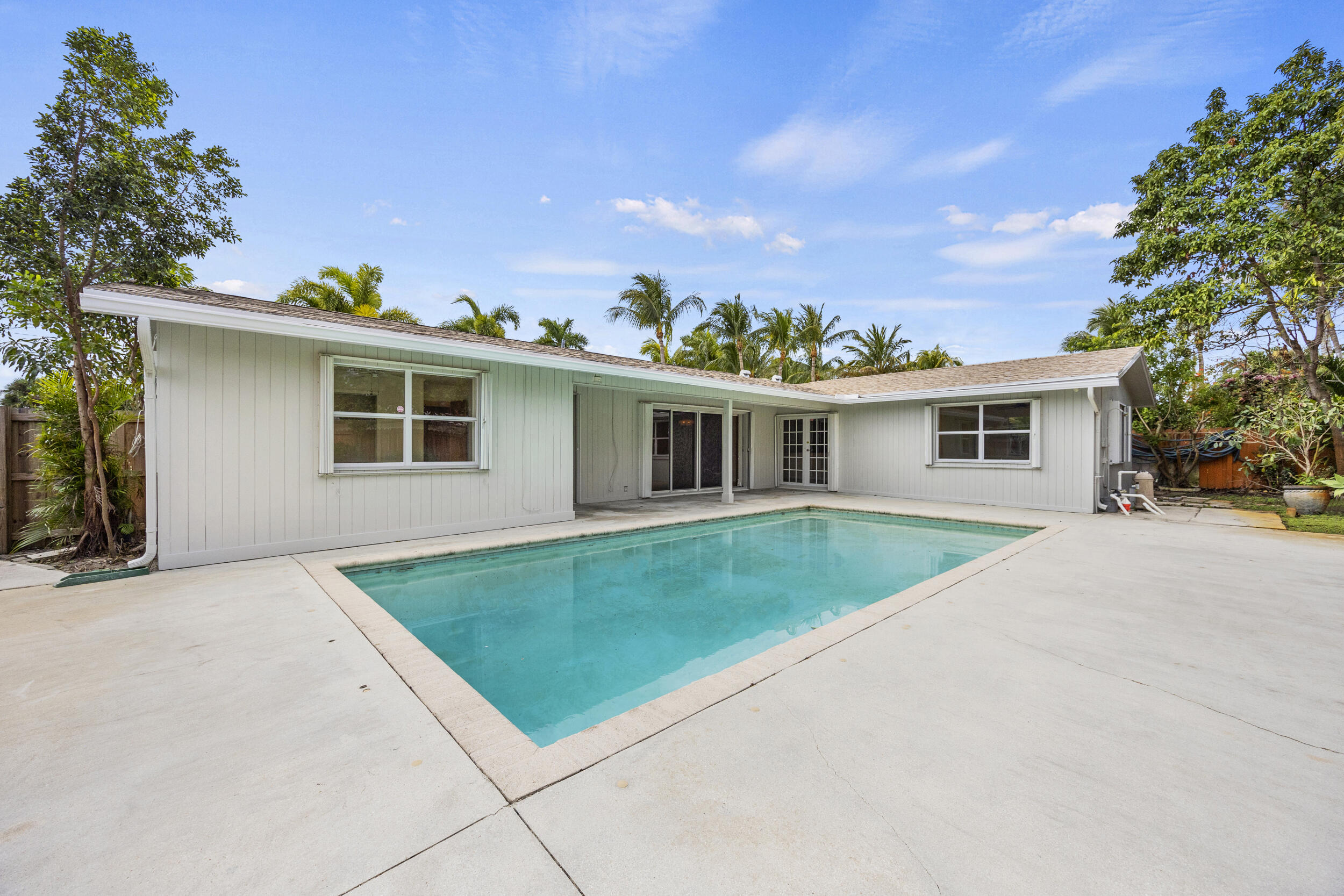 723 Southwest 27th Terrace Boynton Beach, FL 33435 - Photo 42 of 54 Backyard Patio w/ Inground Pool