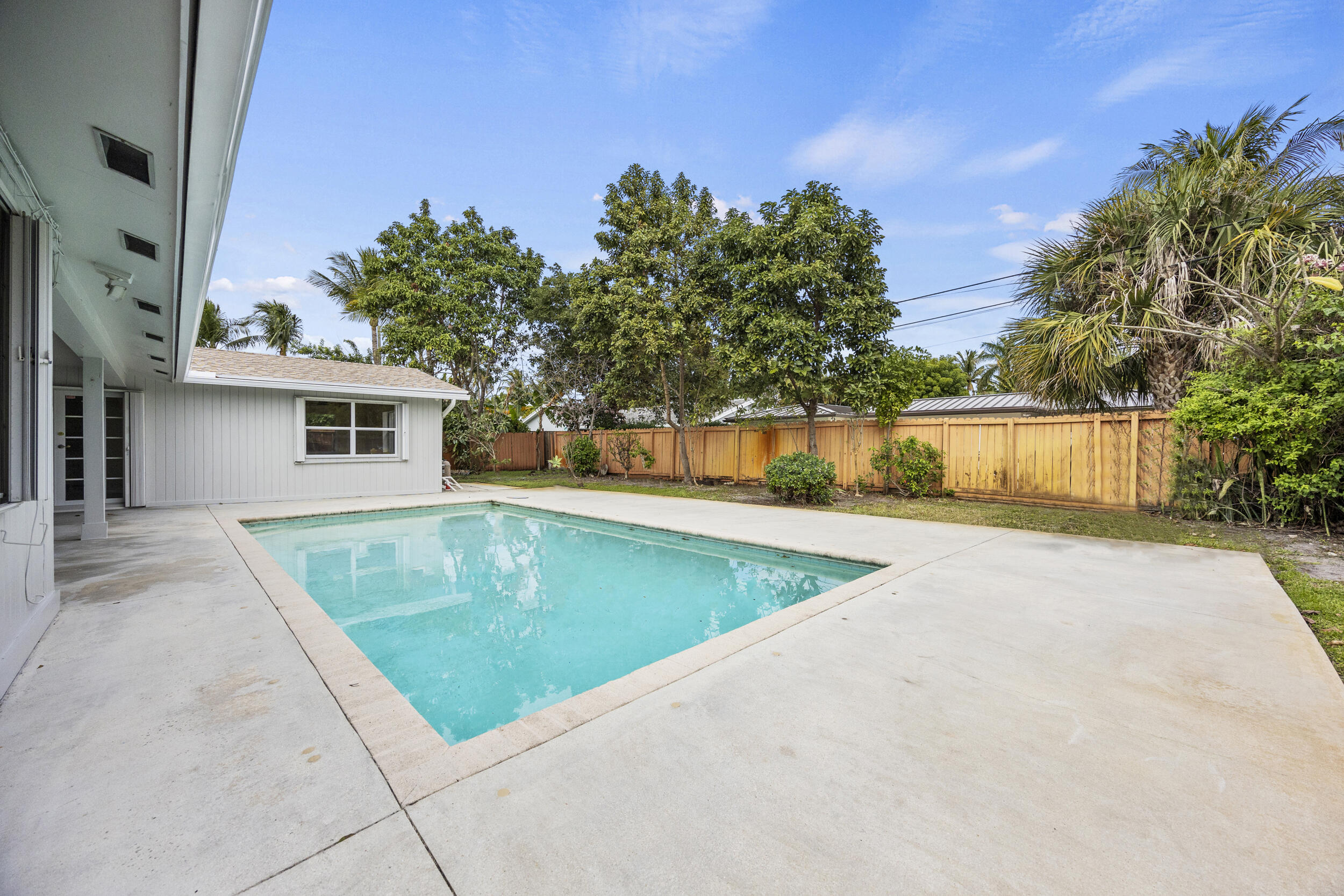 723 Southwest 27th Terrace Boynton Beach, FL 33435 - Photo 44 of 54 Backyard Patio w/ Inground Pool
