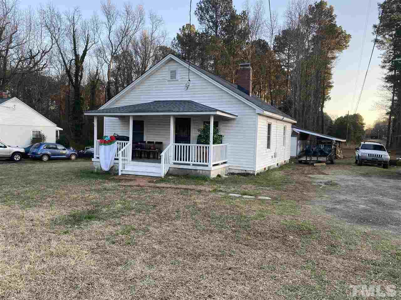 2304 Ferrell Road Durham, NC 27704 - Photo 2 of 6 a view of a house with a yard