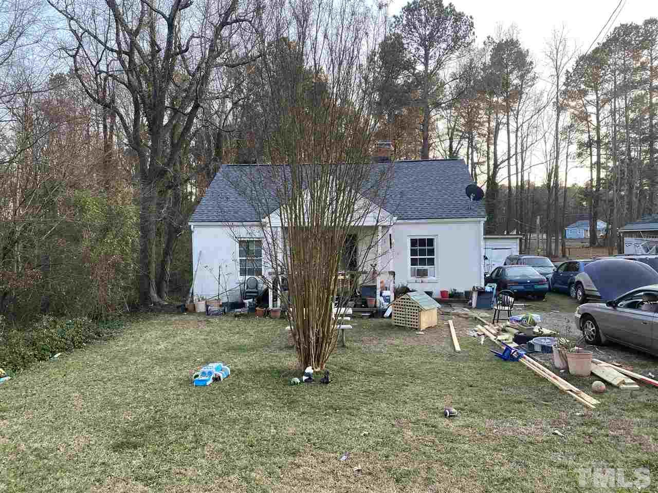 2304 Ferrell Road Durham, NC 27704 - Photo 4 of 6 a view of a house with backyard and sitting area