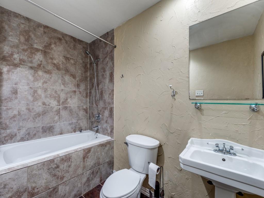 1709 Canadian Trail Plano, TX 75023 - Photo 11 of 12 a bathroom with a sink and a toilet